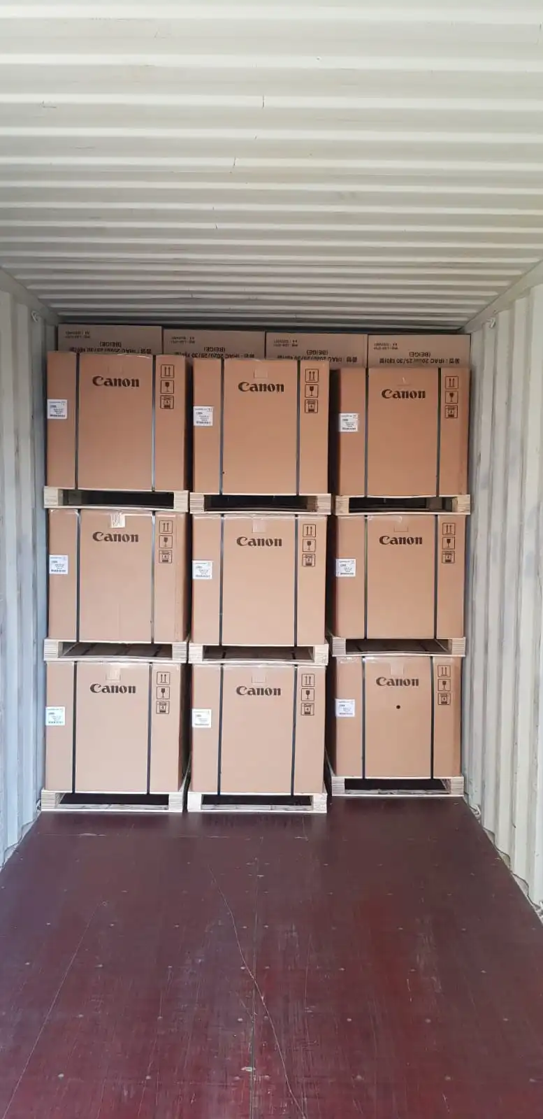 Packed copiers loaded for international dispatch