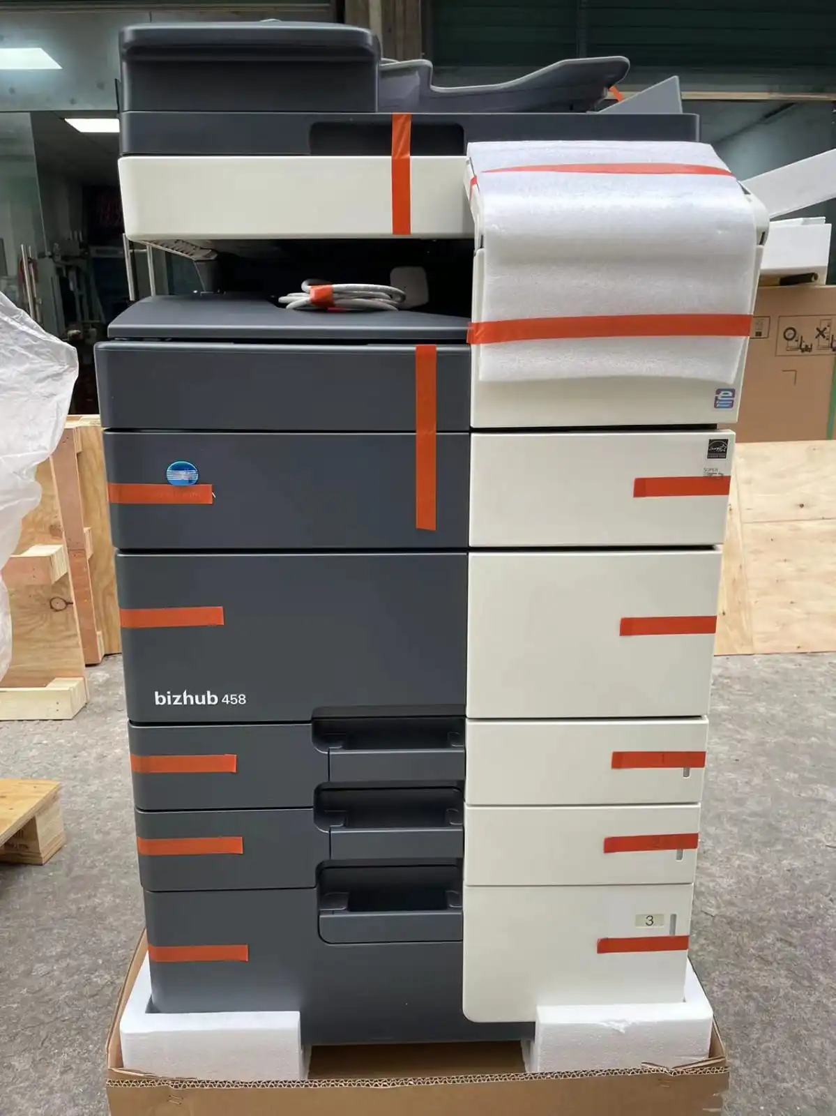 Copier packed in protective materials for export